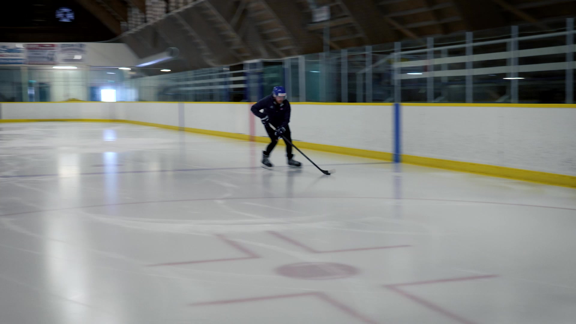 Developing hockey player working on speed and decisions